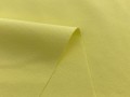 Żółta tkanina ubraniowa z elastanem