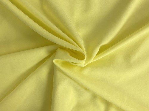 Żółta tkanina ubraniowa z elastanem